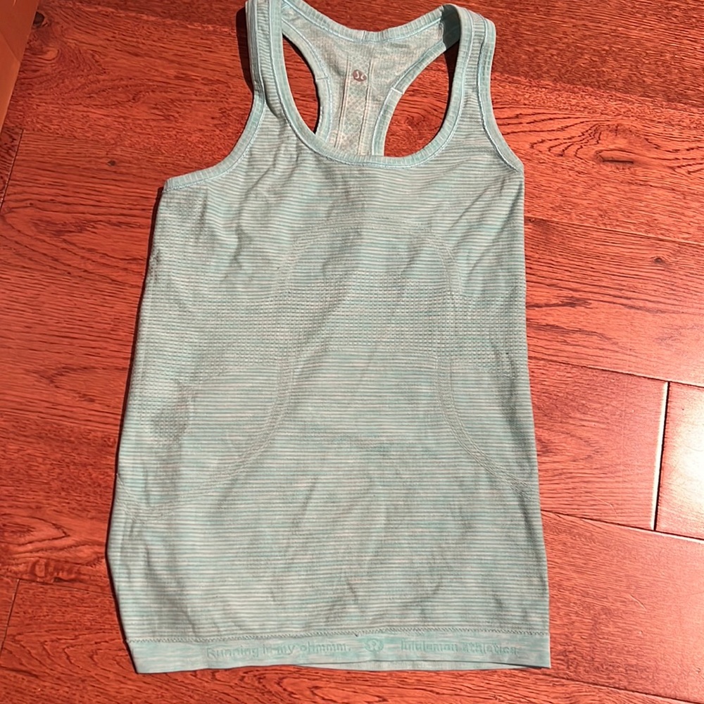 Two Lululemon running tank tops